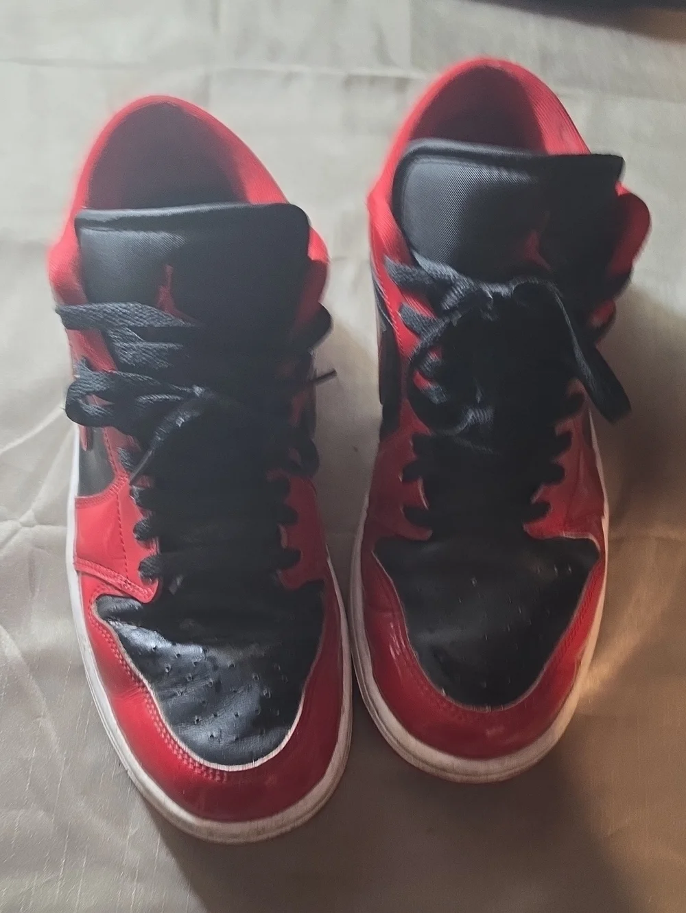 Jordan Red and Black High-Top Sneaker Tongue Label Detail
